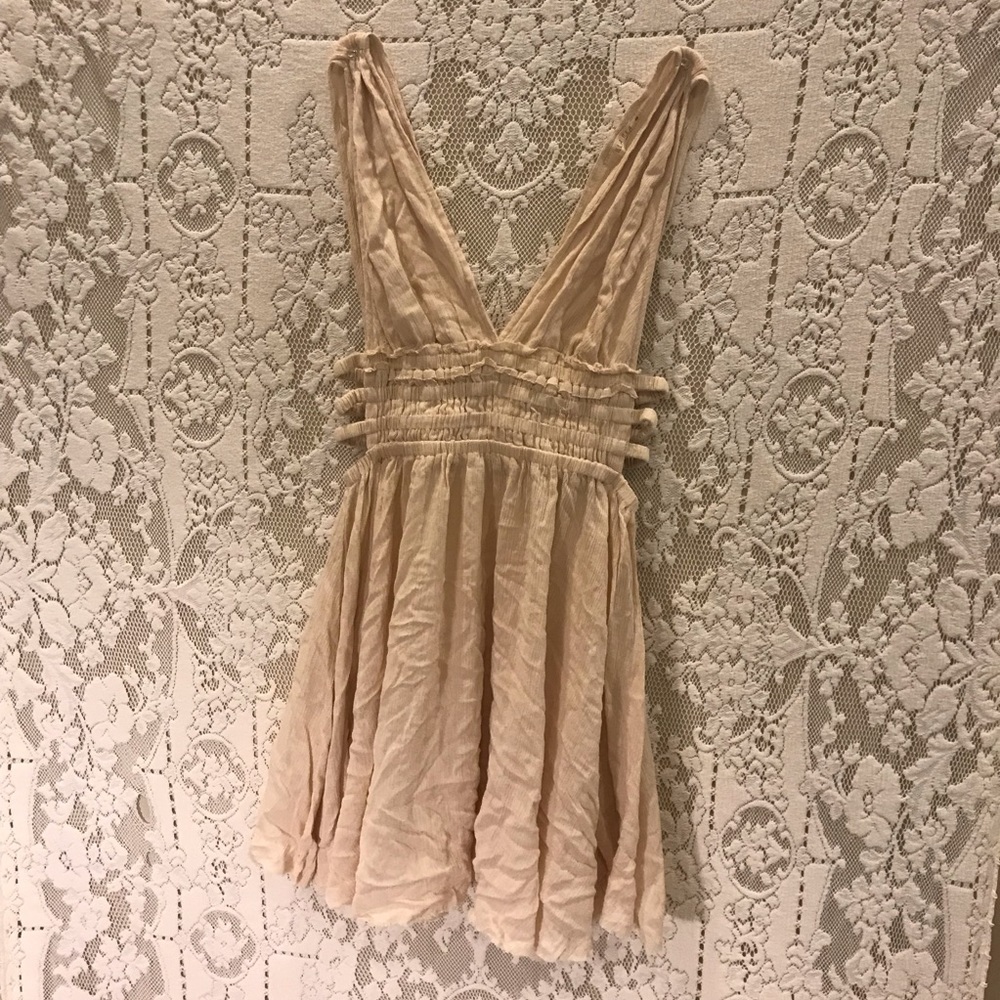 Cream side cutout plunge dress